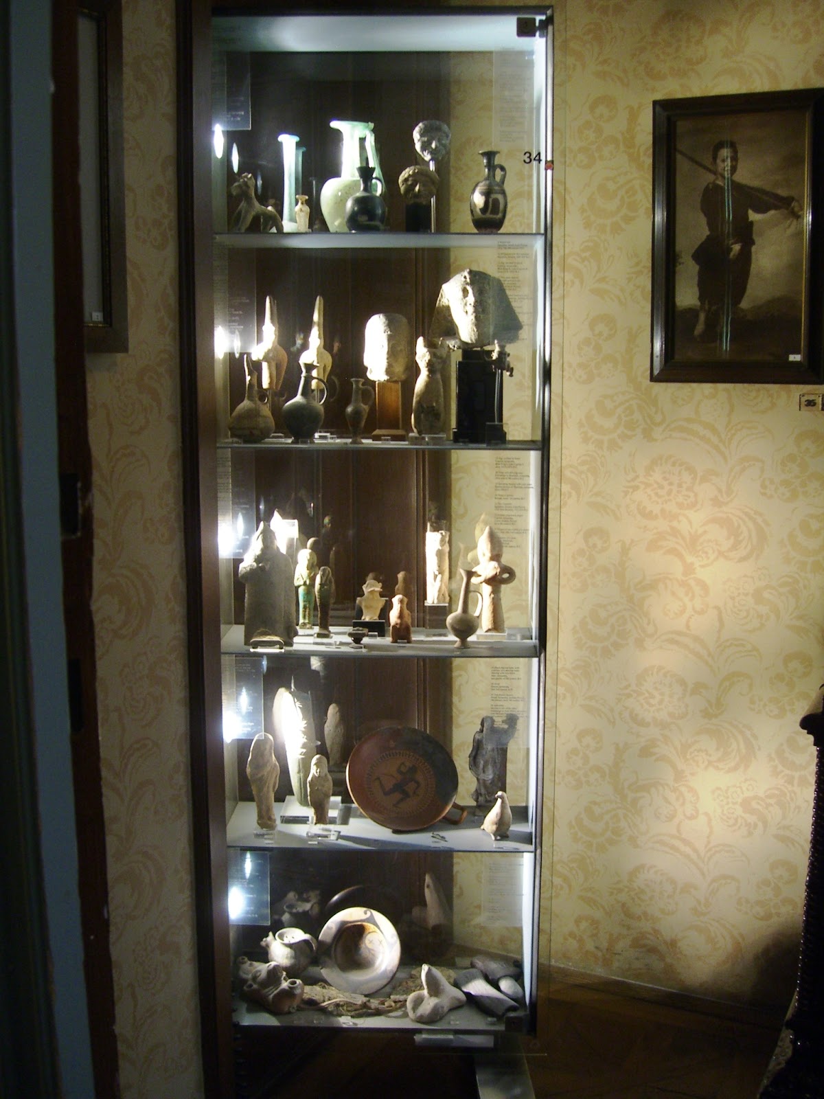 Light can be custom fit to any glass cabinet regardless of design. Source: Wikimedia Commons