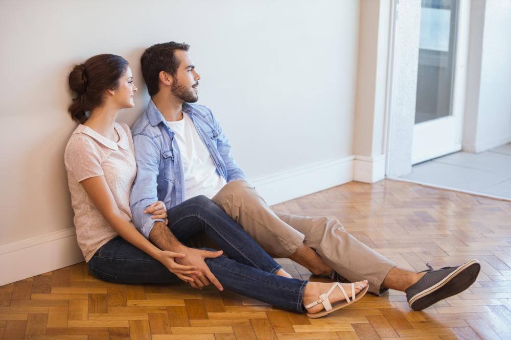 http://streaming.yayimages.com/images/photographer/wavebreakmedia/17930bf049924de65a4f3659b090920b/cute-couple-sitting-on-floor-against-wall.jpg