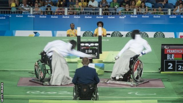 Andrei Pranevich of Belarus battles Ammar Ali of Iraq in the final of Wheelchair Fencing Men's Category B at the Rio Paralympic Games