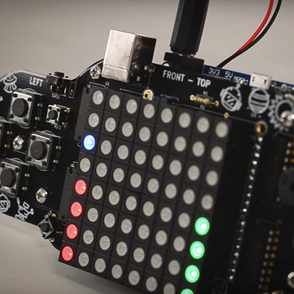 Thimble's RGB Controller is pictured completely assembled with some of the lights on the LED panel lit up.