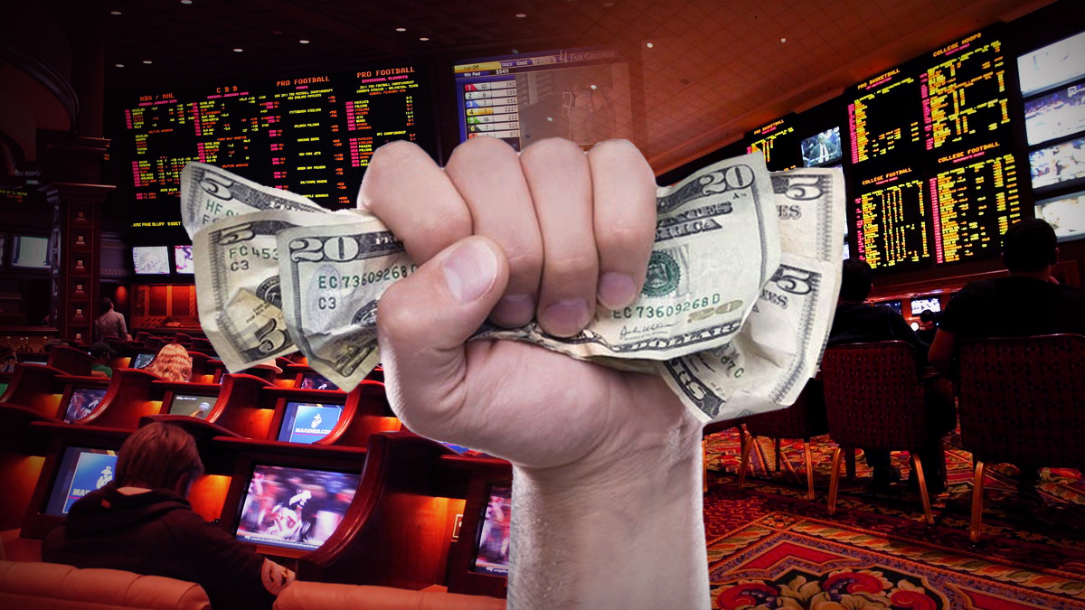 bettor making a budget in sports betting