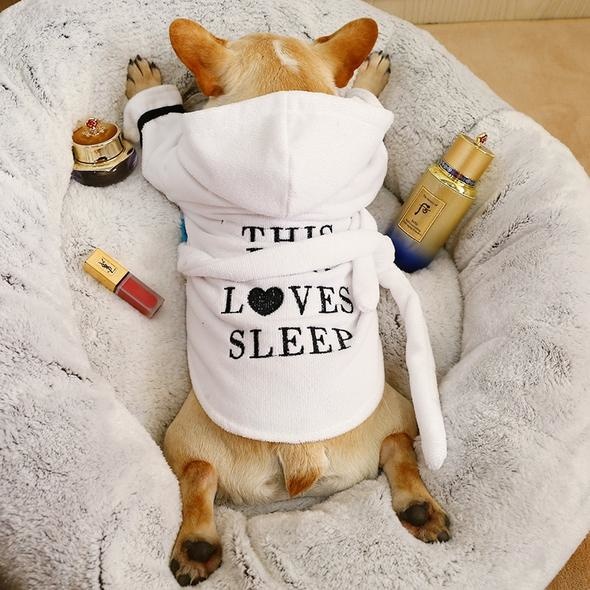 This dog loves sleep bathrobe