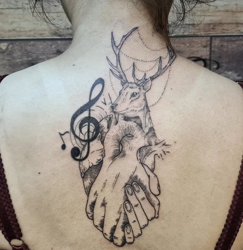 Holding Hands With Musical Symbol Stag Tattoo Designs Ideas