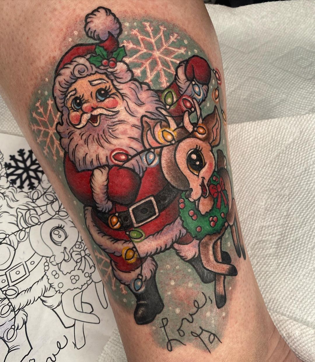 Cartoon Santa And Reindeer With Christmas Lights Tattoo