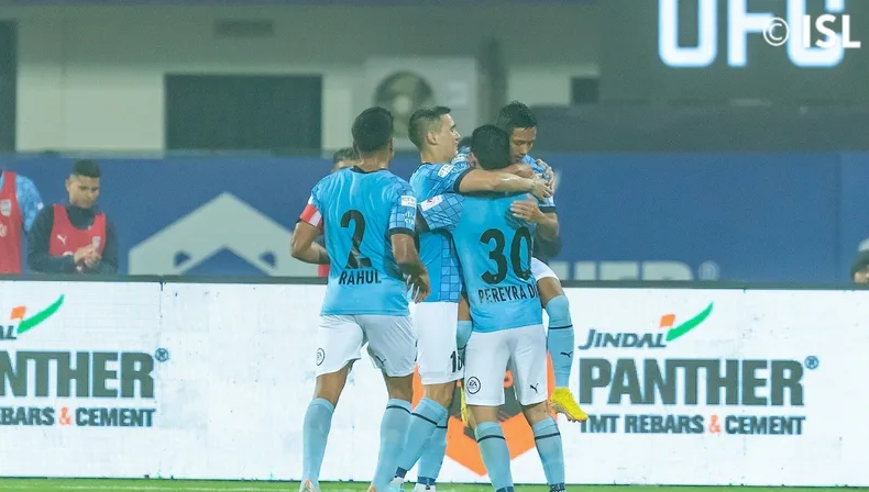 Mumbai City players celebrate a goal