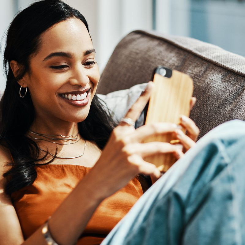 a woman managing a phone