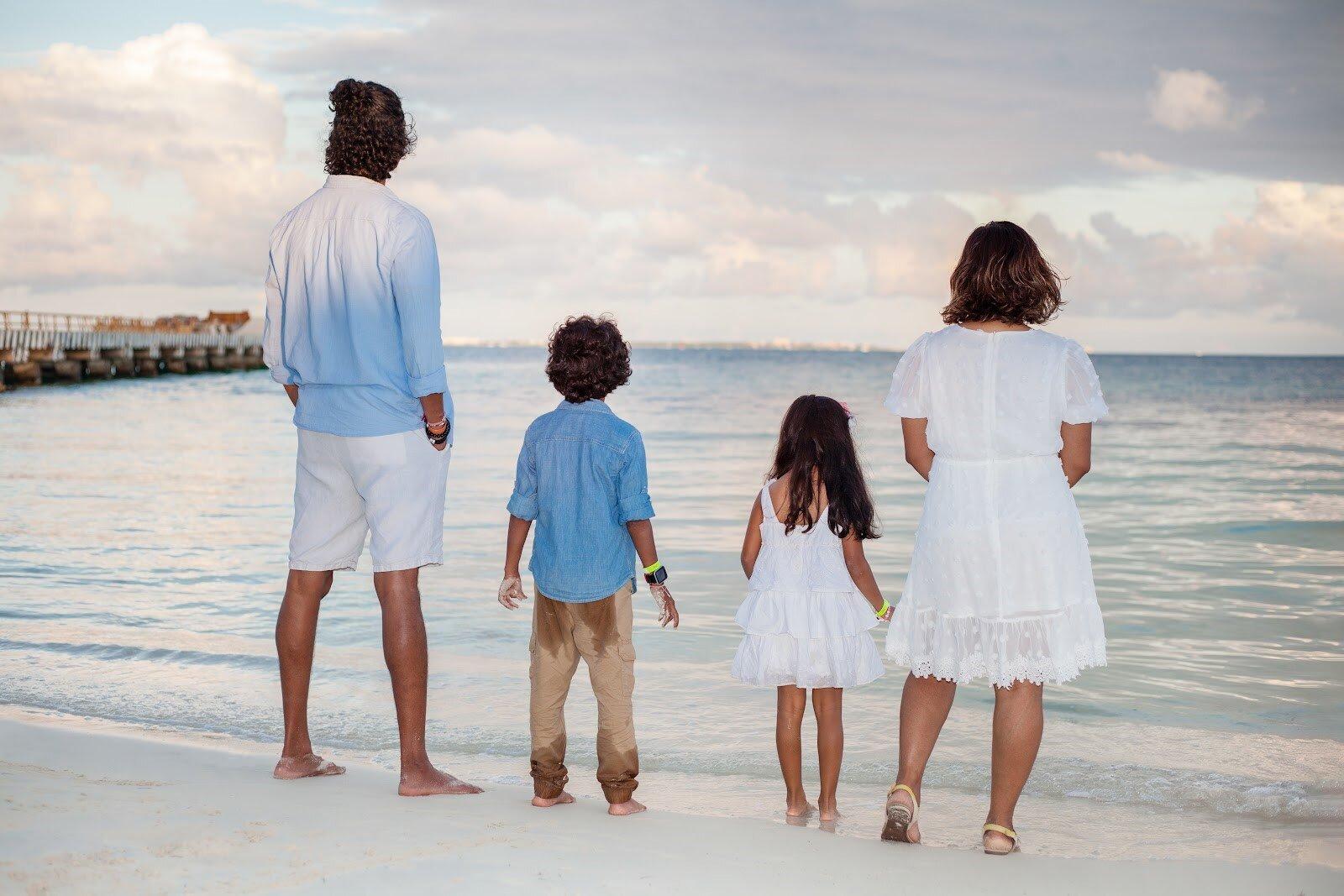 Family capturing memories from a professional photographer on their Mexico trip