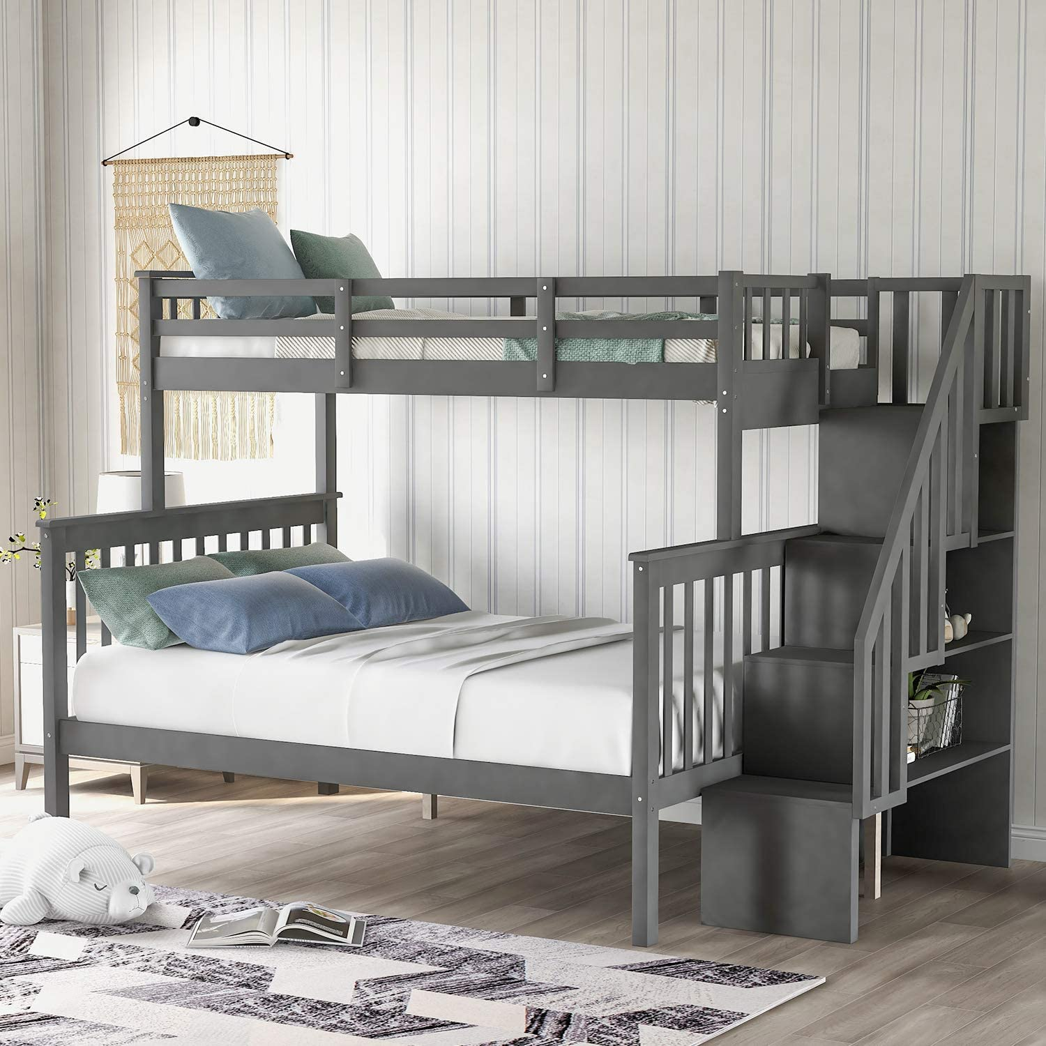 A unique bookcase bed idea. Use this bunk bed unit with stairs and a bookcase, in a child’s bedroom.