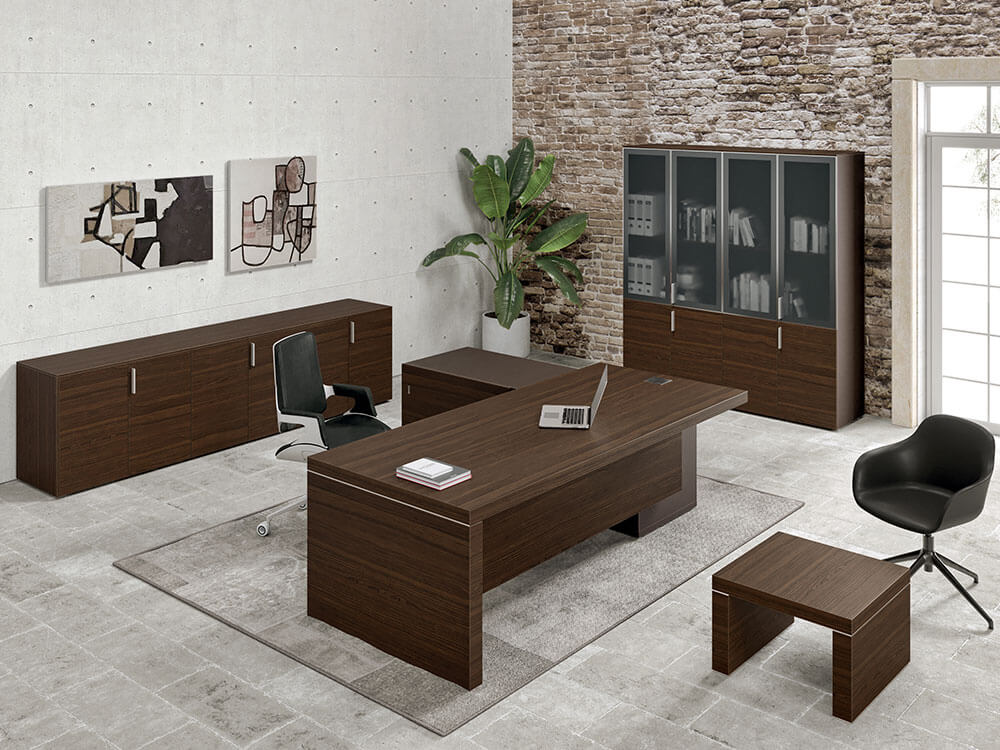An executive desk surrounded by stylish chairs, creating a sophisticated and collaborative office environment.