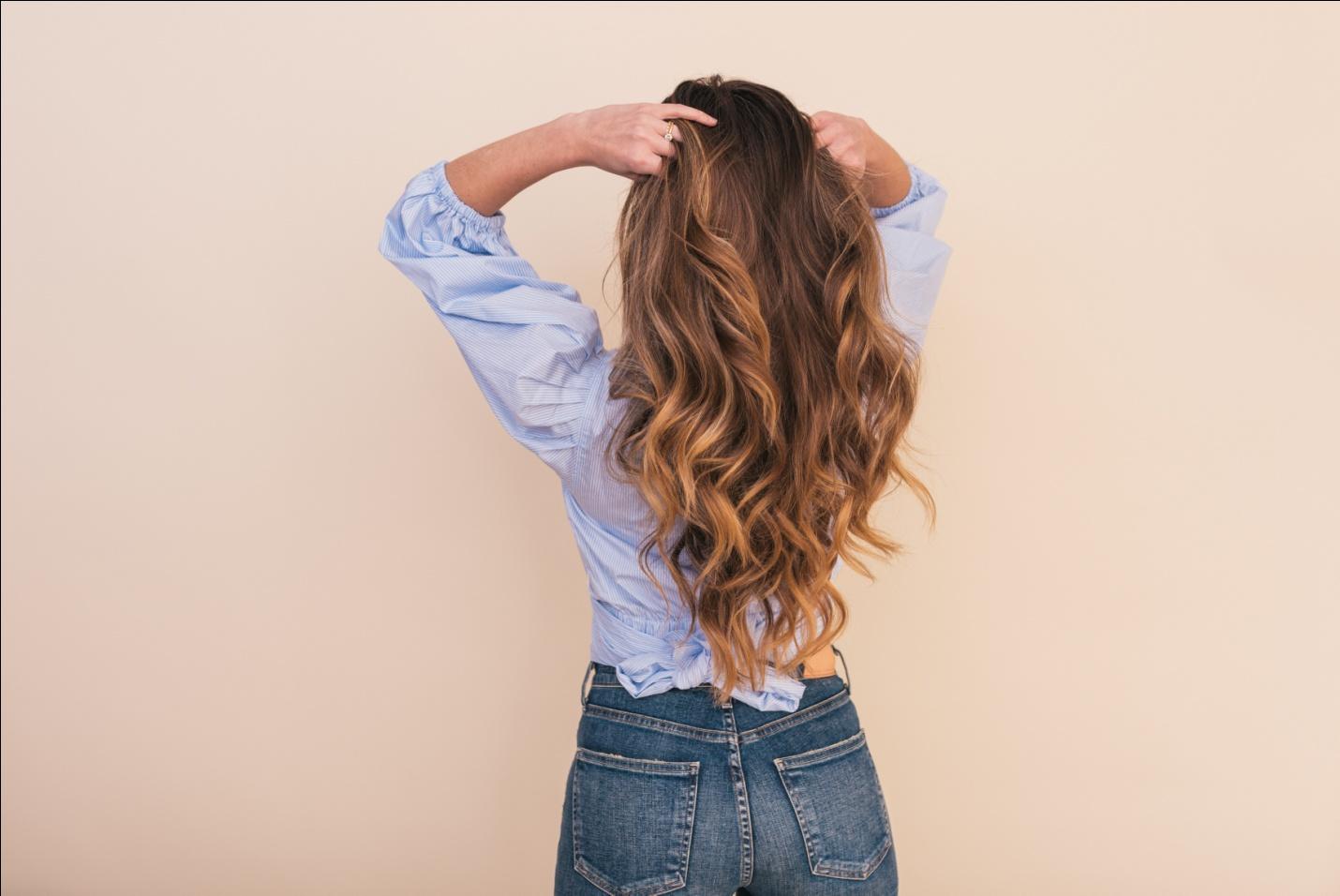 Woman showing her ombre hair