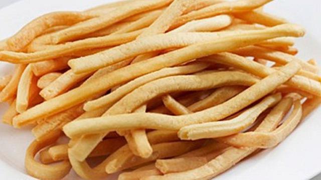 A plate of french fries

Description automatically generated