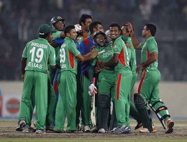 Bangladeshi players celebrate after beating India