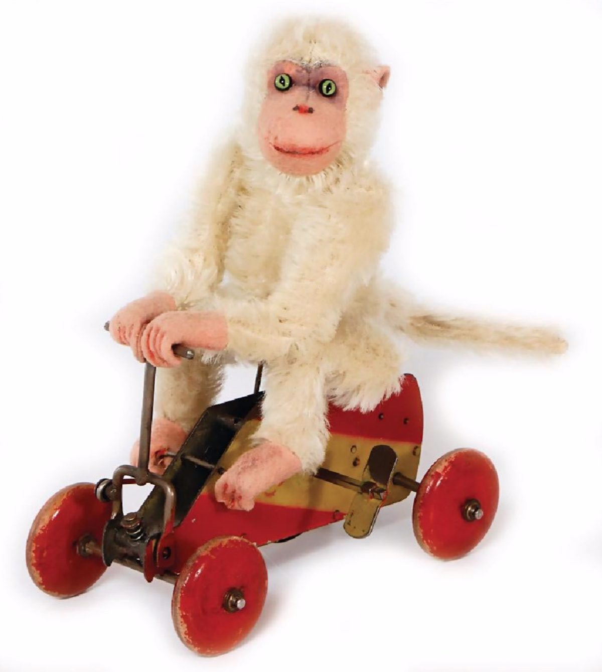 Steiff mechanical chimp on wheels that sold for about $4,000 through Ladenburger Spielzeugauktion GmbH; image from Liveauctioneers.