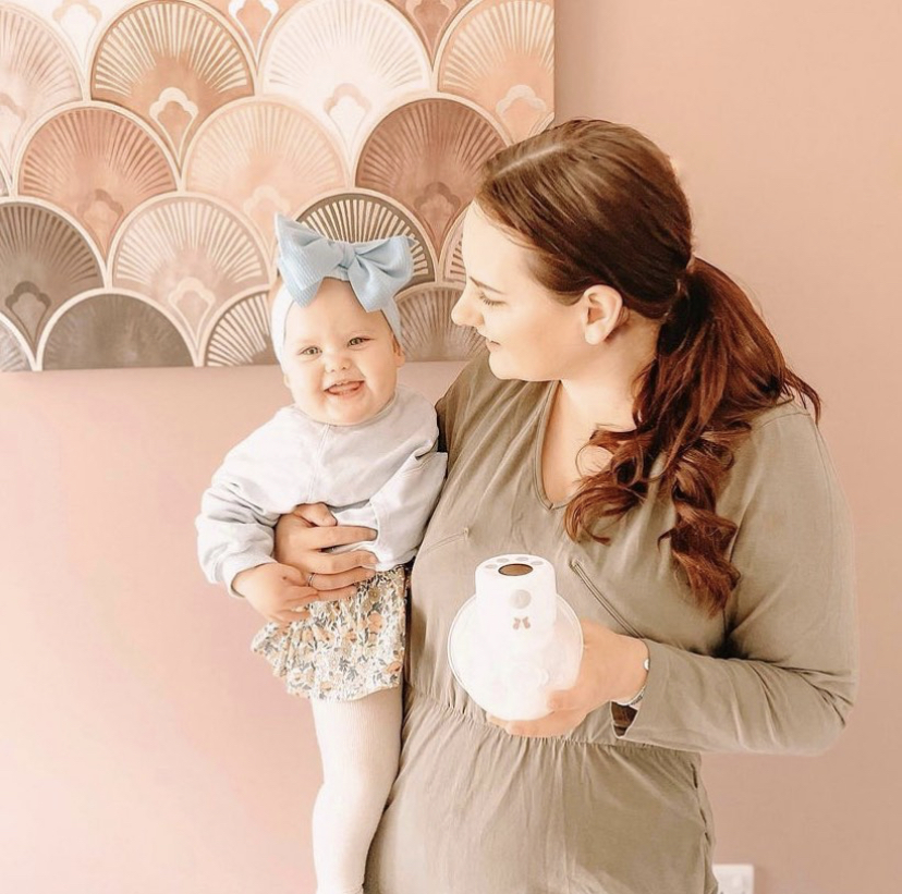 mother using the Fraupow hands-free breast pump