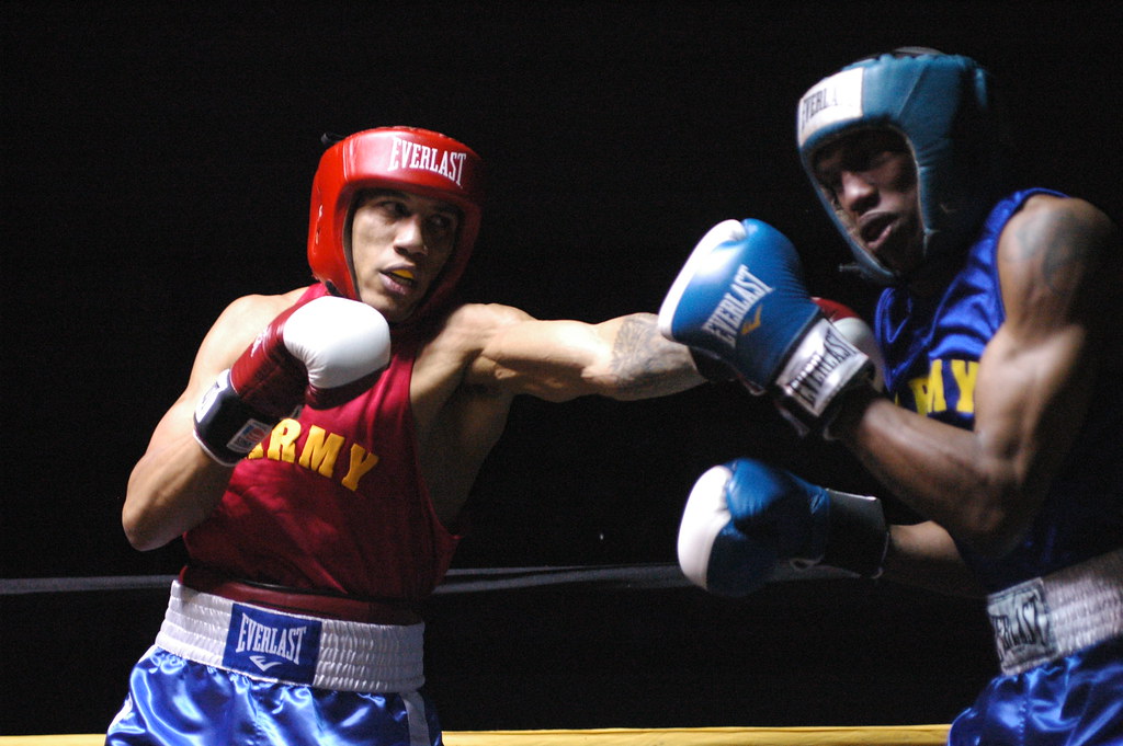 Two boxers fight each other