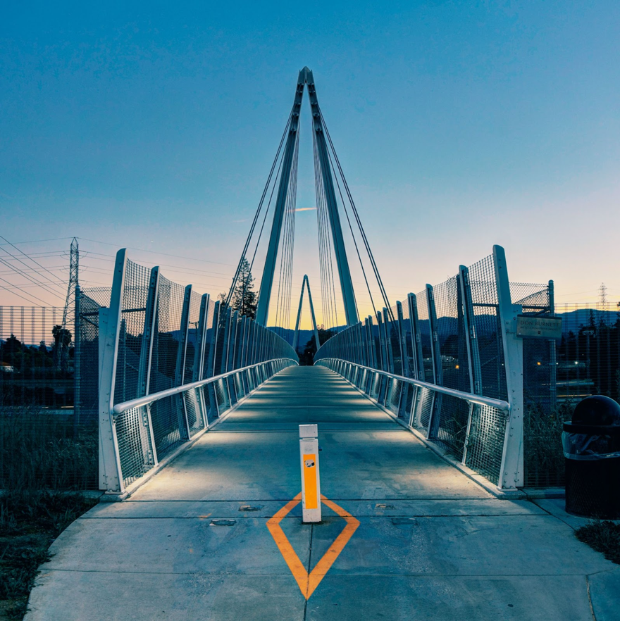 A picture containing outdoor, sky, building, bridge</p>
<p>Description automatically generated