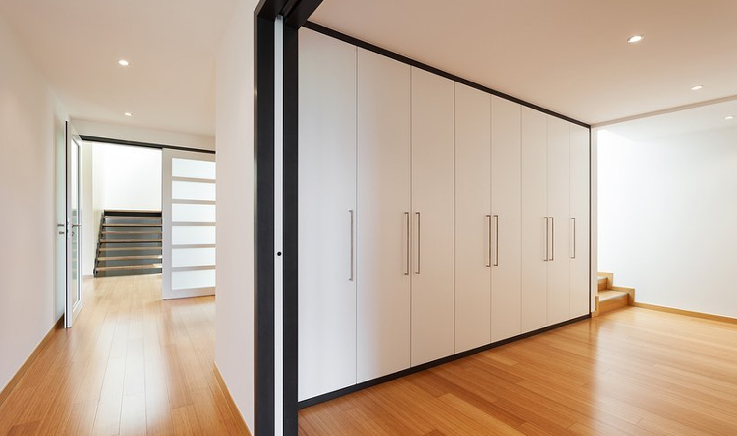 Artuz offers Lacquered Glass Sliding Wardrobe Shutters in Bangalore, F2C wardrobes with a shiny and rich finish to your wardrobe with the sliding mechanism