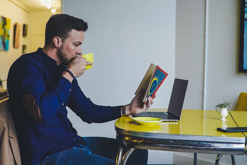 man at desk with laptop