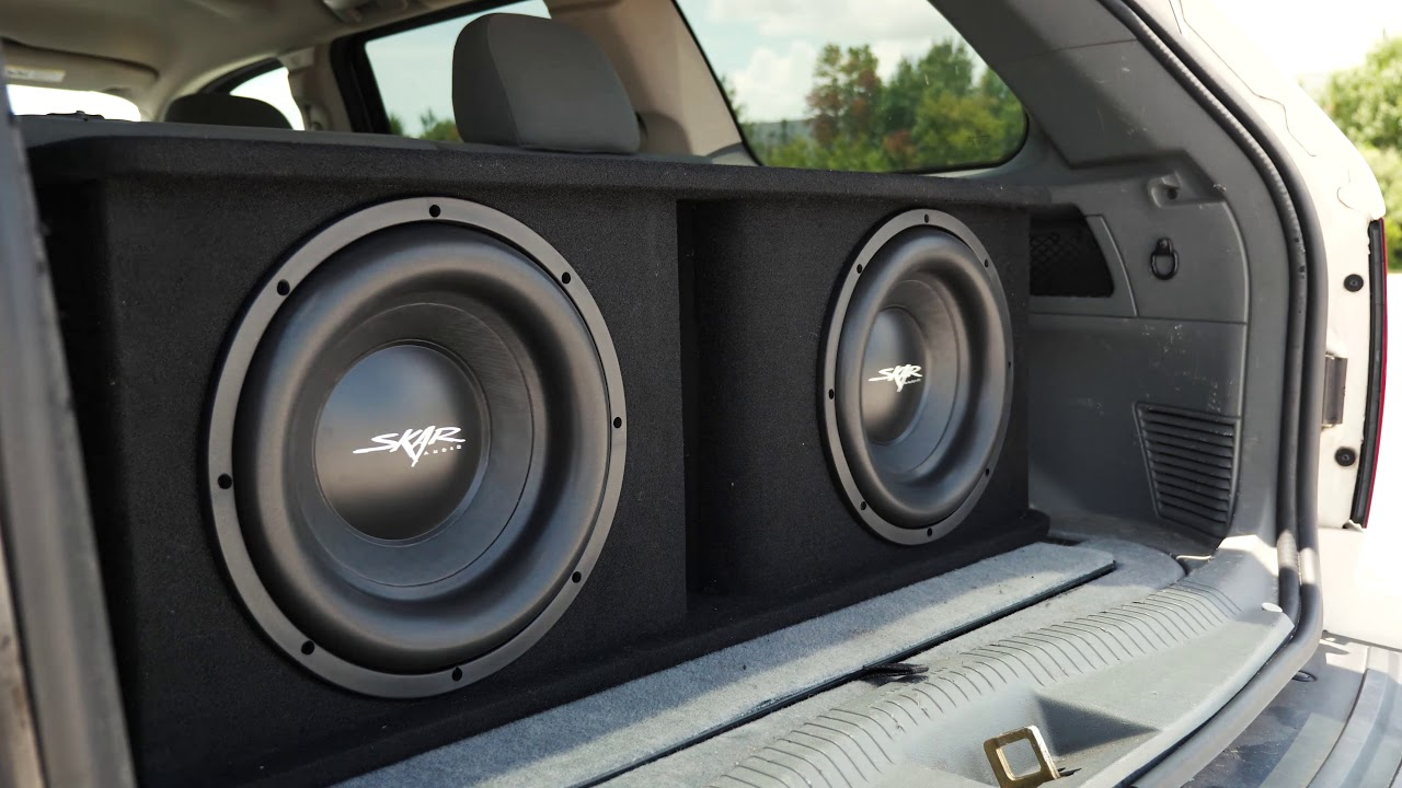 A picture of skar subwoofers in a car