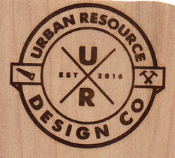 Branding iron logo on light wood