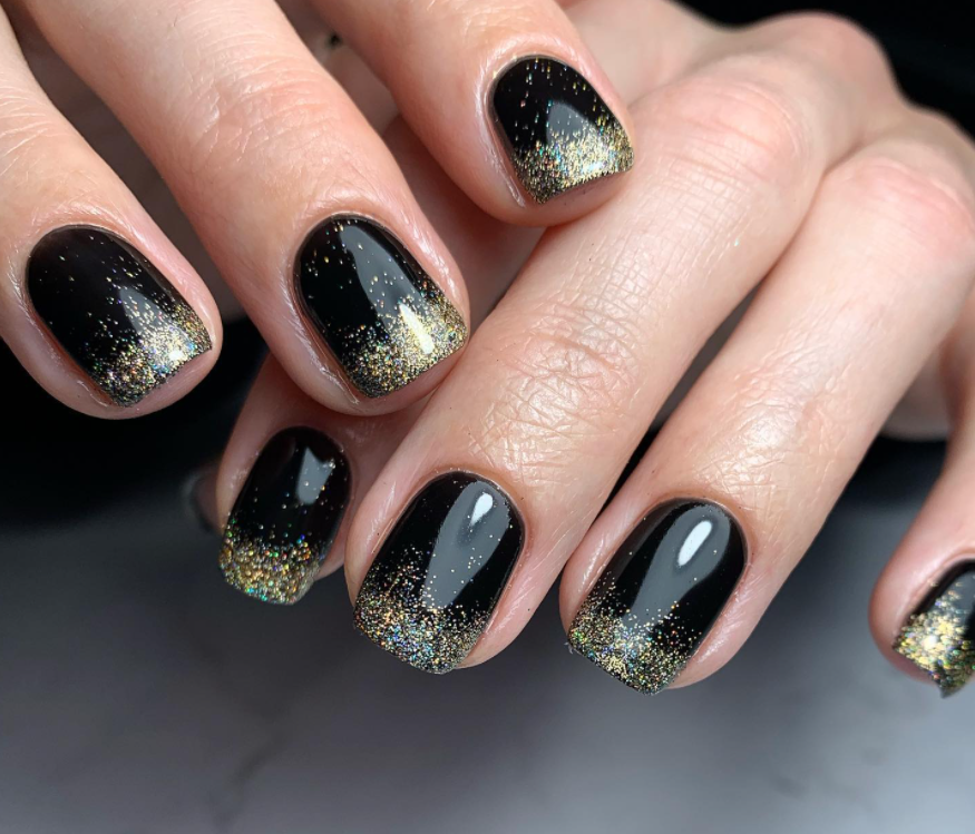Glossy Black Nails with Golden Glitter
