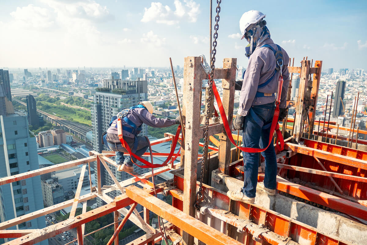 Safety incident: construction workers working on a building