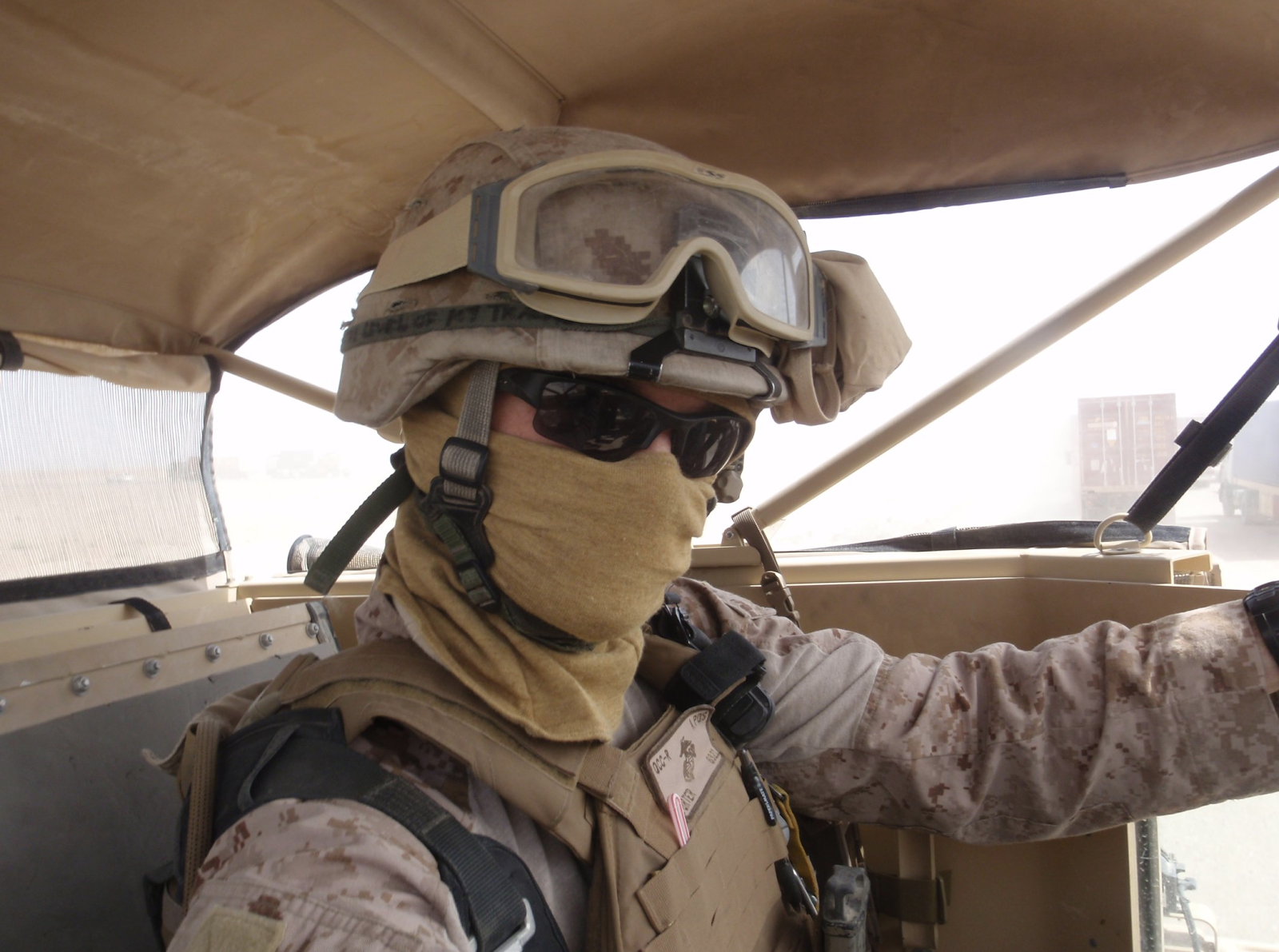 Author, RichardiPorter wearing a balacalava Mask in Afghanistan for Dust then. For the Virus Now. 