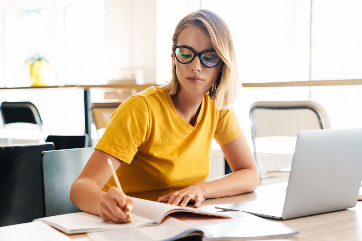 Entrepreneur writing on a notebook