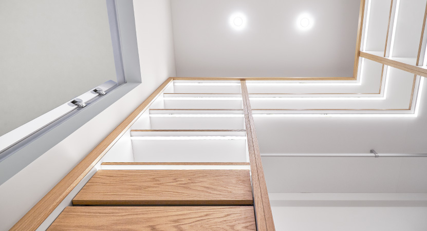 A newly remodeled pantry with LED lighting built into the shelves. 