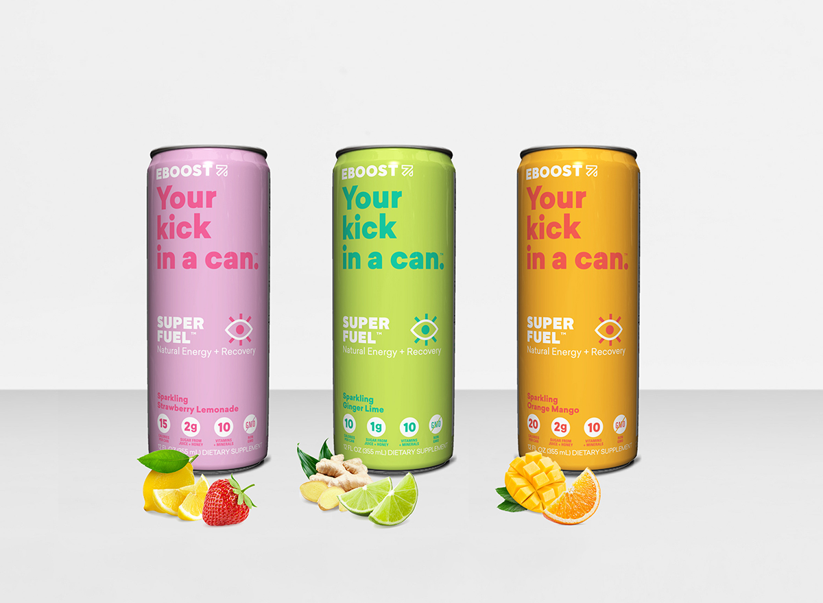 3 colorful E-Boost energy drink cans with the flavor of each represented below. Strawberry-lemon, ginger-lime, mango orange