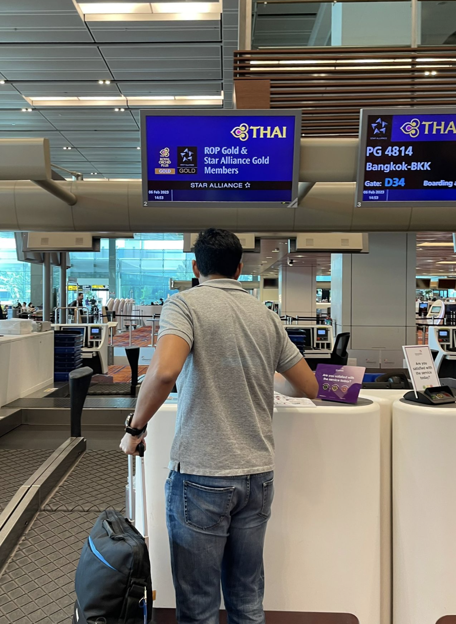 Thai Airways check-in at Singapore Changi Airport.