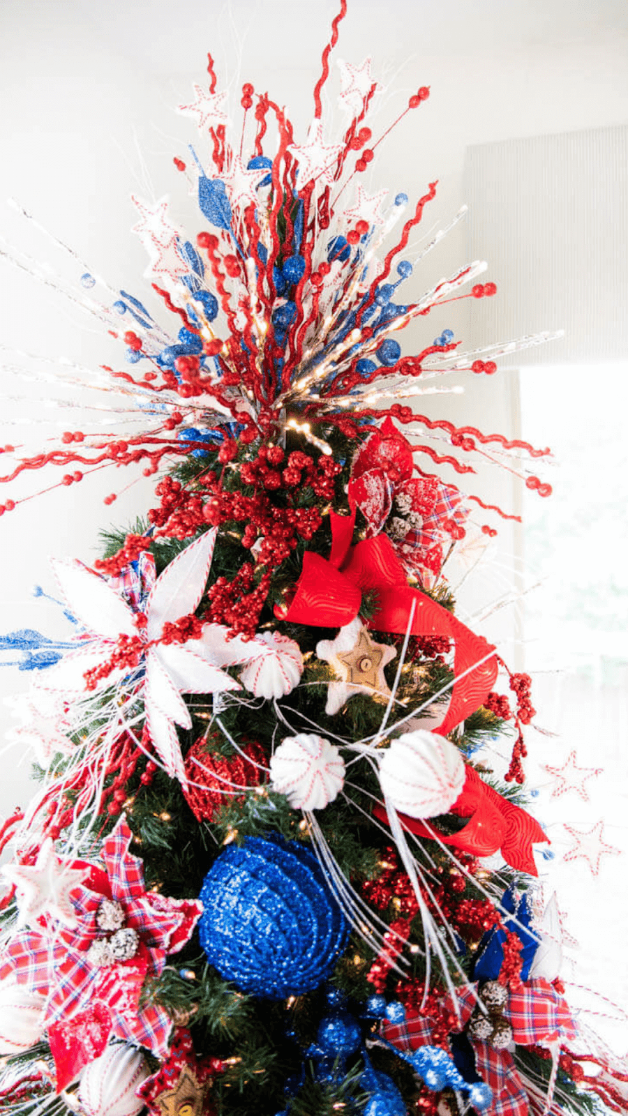 red, white, and blue tree topper sprays
