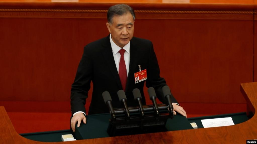 全国政协主席汪洋在中国政协年度会议上作工作报告。(2021年3月4日)