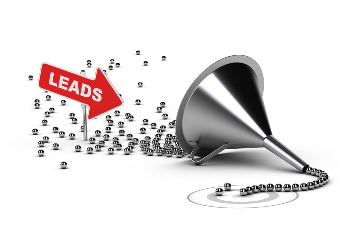 digital marketing strategy - metal funnel with beads as "Leads"