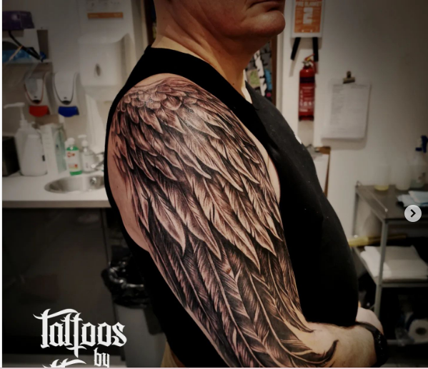 Feather Art Half Sleeve Tattoo