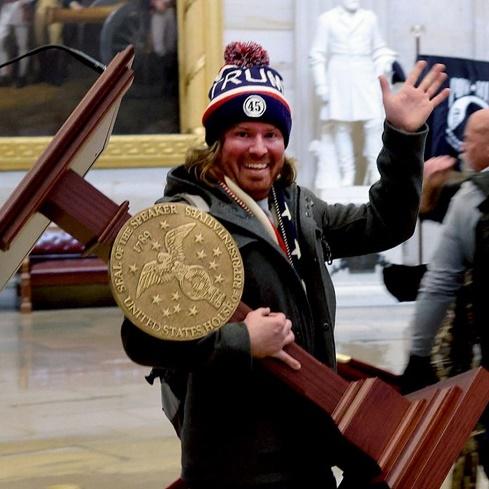 Florida man arrested for stealing House Speaker's lectern during Capitol  riots - REVOLT