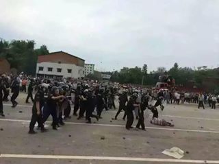 'China: Massive Protest in Linshui Intense Repression and Resistance  Tens of Thousands of residents of the southwestern county of Linshui gathered in the morning and marched about 3km. Photos posted by the protesters on social media also showed violent attacks by a police tactical team(SWAT)and the resistance that followed lasted all day and well into the night.  http://revolution-news.com/china-massive-protest-in-linshui-intense-repression-and-resistance/'