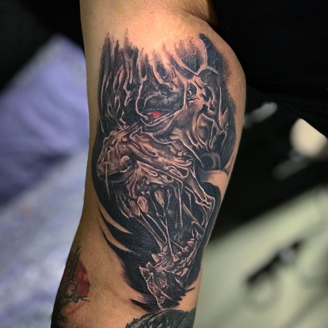 Wonderful Red Eye Zombie Tattoo On Leg