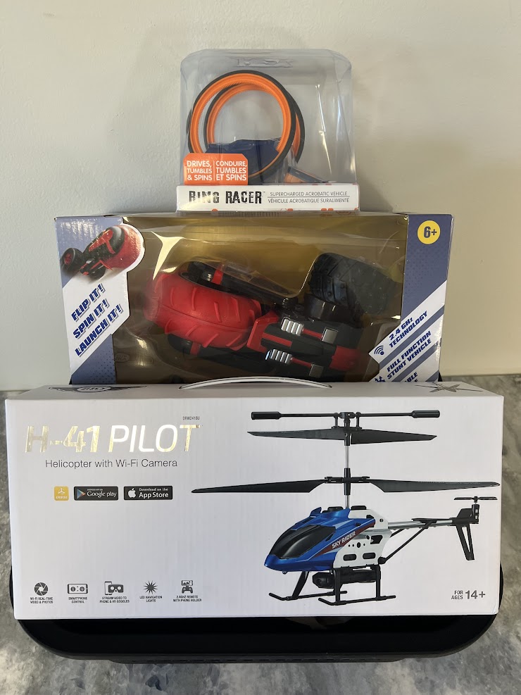 Remote Control H-41 Pilot Helicopter with Wi-Fi Camera, Air Rebound Remote Control Vehicle, HexBug Ring Racer
-Donated by The George Family  &  FAW Friends & Families