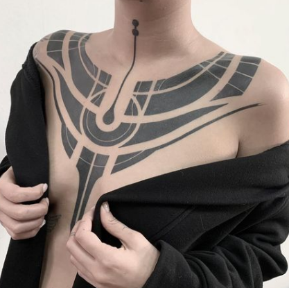 The Geometric Forms Chest Tattoo