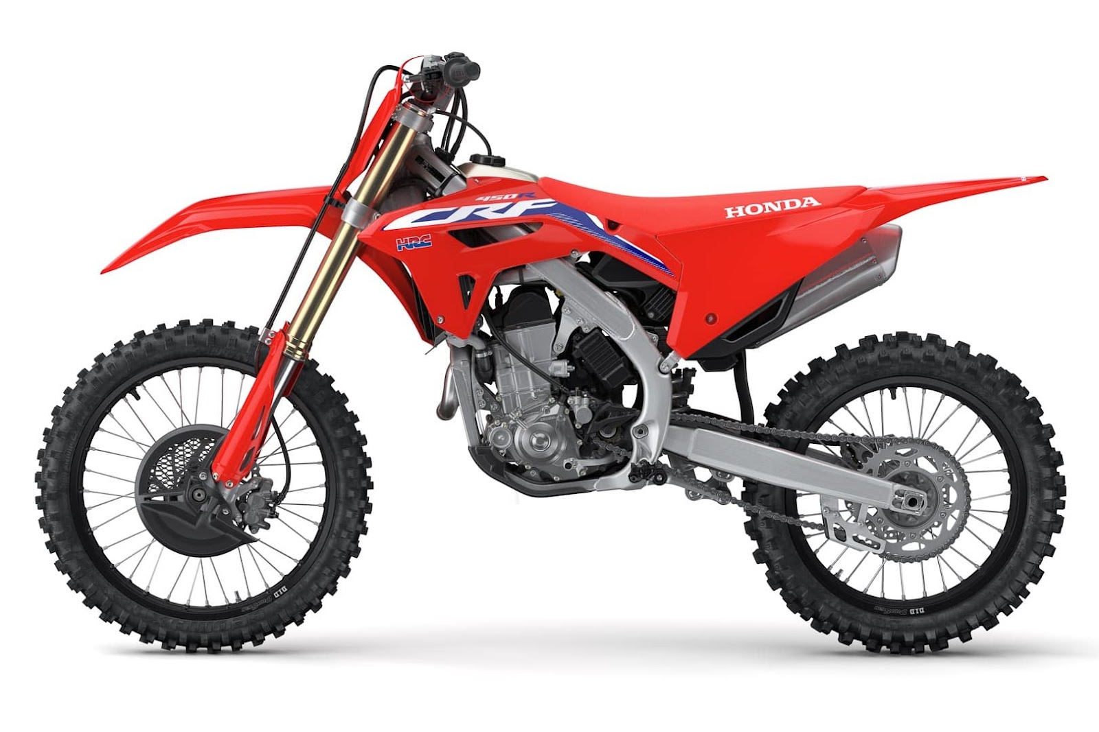 2023 bright red Honda CRF450R off-road motorcycle in a showroom