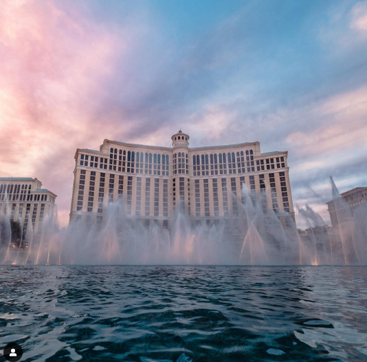 A large building with a fountain in front of it

Description automatically generated with medium confidence