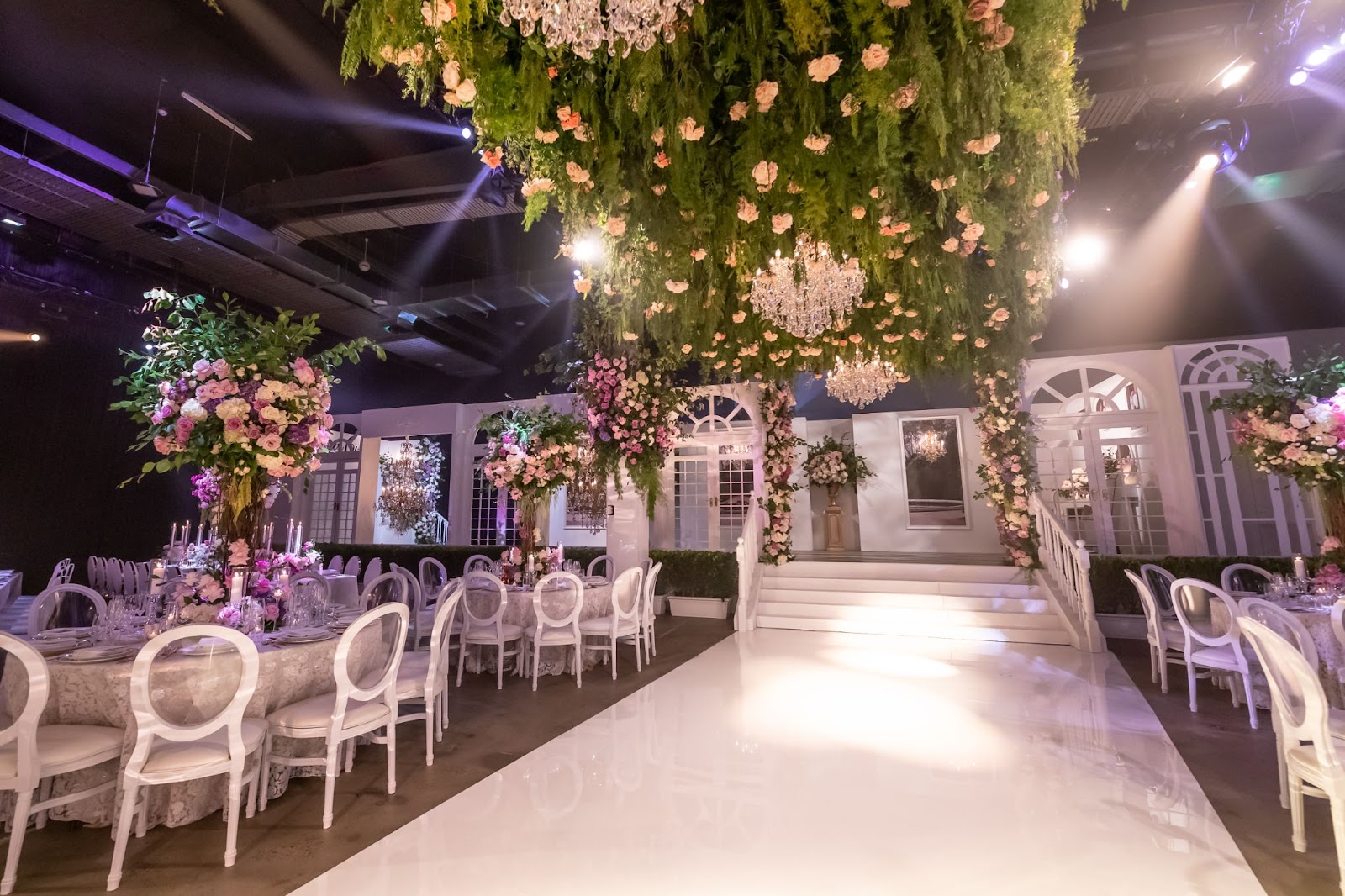 The Venue in Sydney is elevated with the use of botanicals and chandeliers.