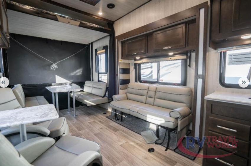 The interior living space of this RV transforms quickly and easily once you’ve unloaded at the campground.