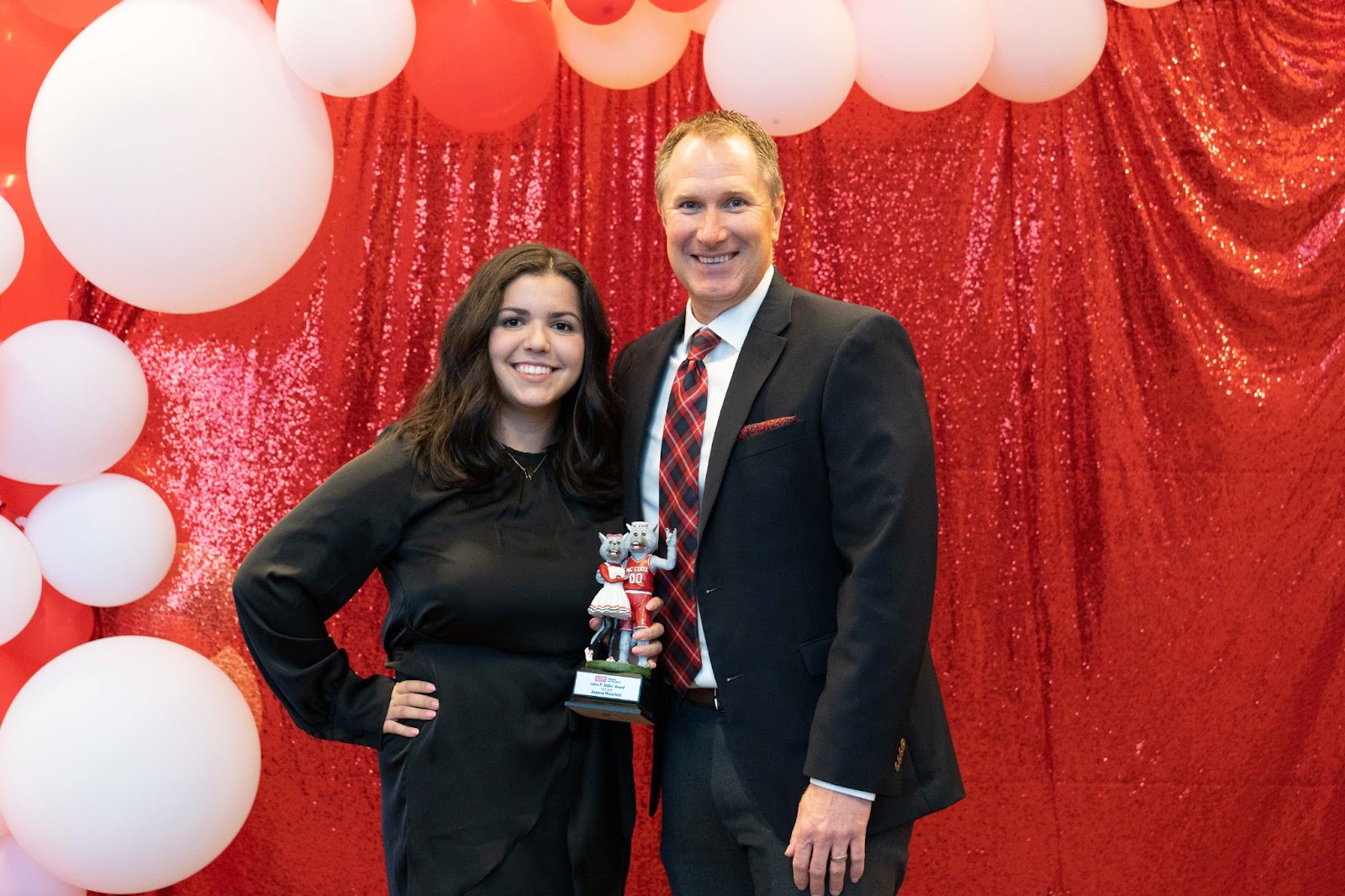 Joanna Wenchell '23 (left) and Eric Hawkes, executive director of Wellness and Recreation (right)