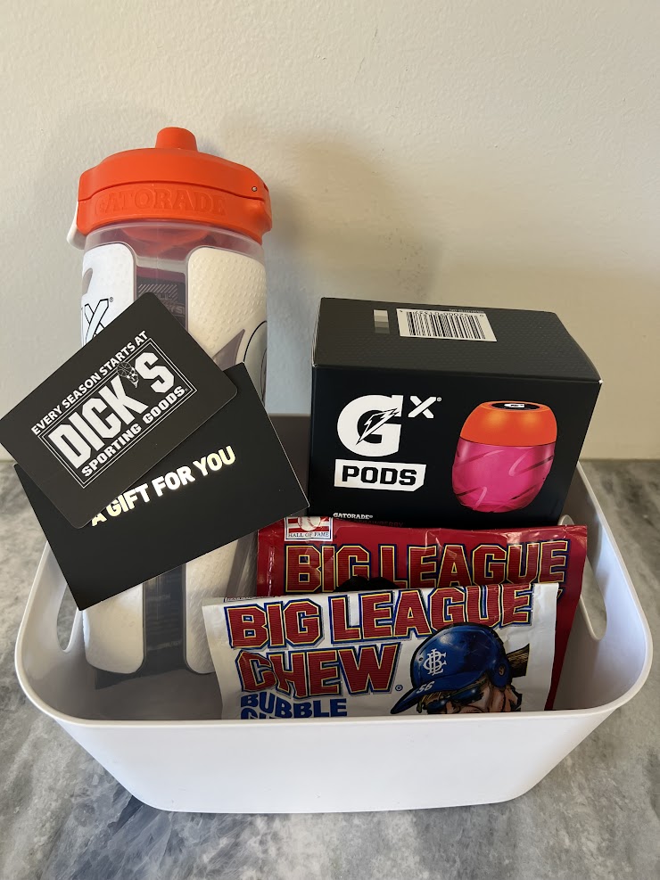 $50 Dicks Sporting Goods Gift Card, 2 packs Big League Gum, Gatorade Water Bottle with Kiwi Strawberry Pods. 
-Donated by Brenda Curry