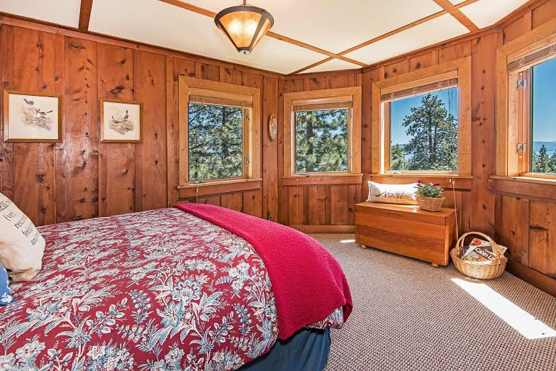 With a beaufiful view of nature from inside its walls, the bedroom of this Incline Village Nevada luxury home for sale is every child's dream.