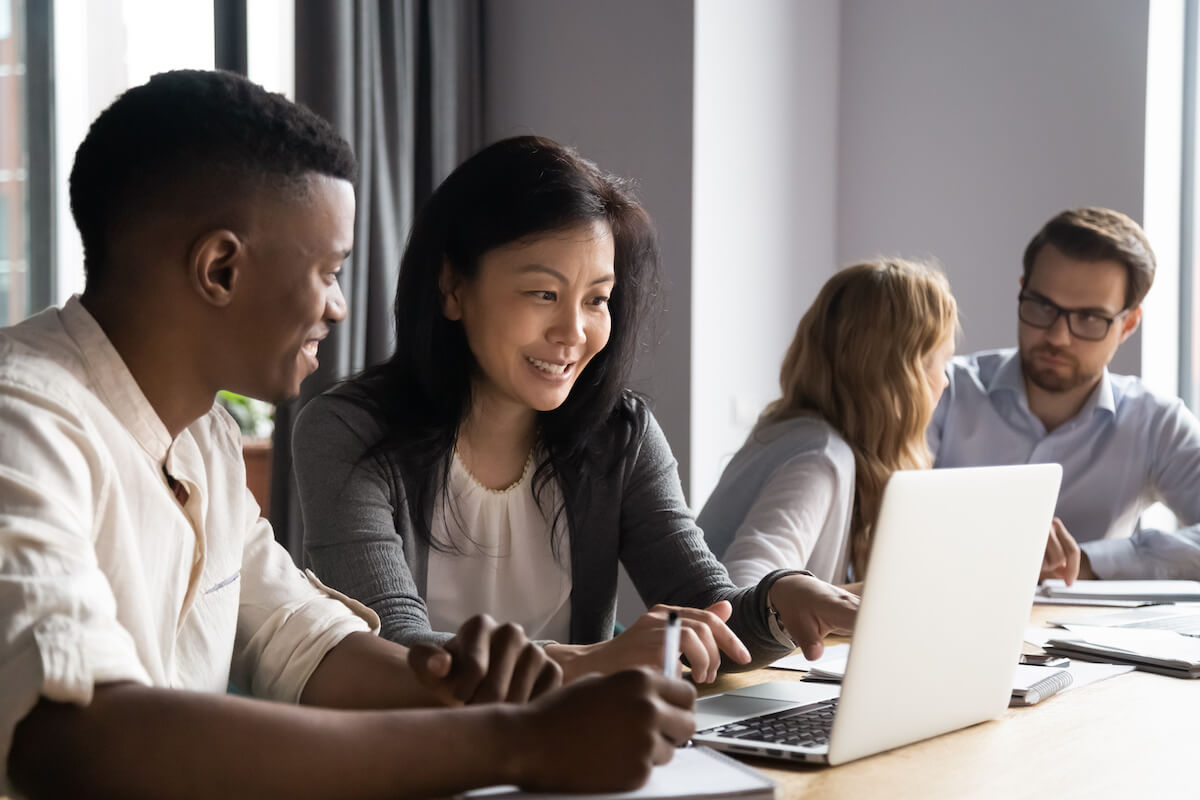 Benefits enrollment: group of employees working together