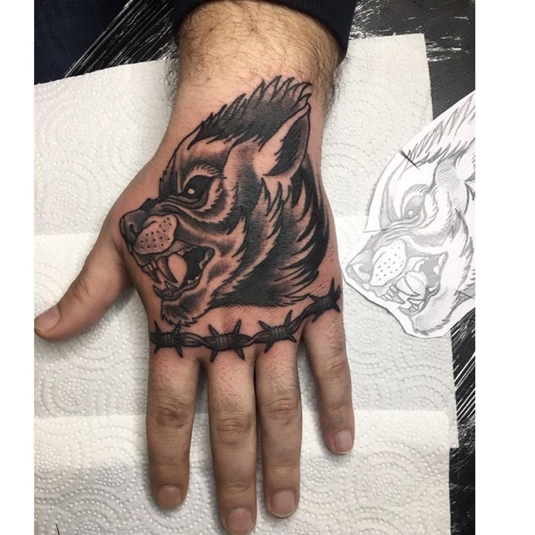 Black Ink Wolf  With Barbed Wire Tattoo