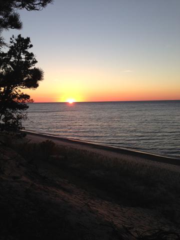 The sun setting during our backpacking trip in Pictured Rocks.